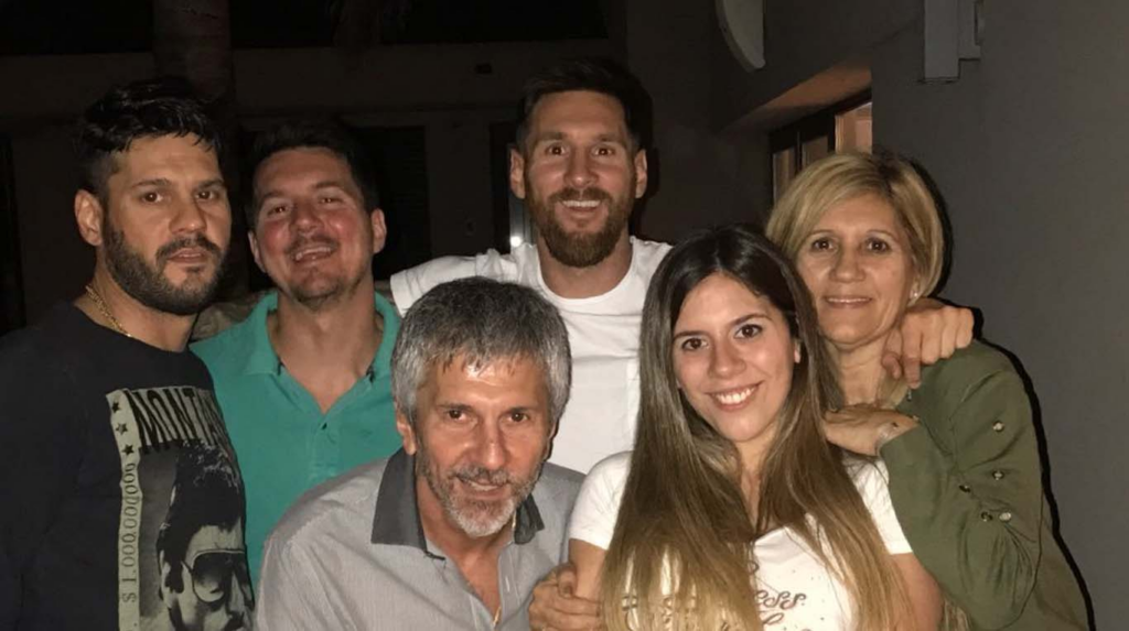 Lionel Messi with his parents and family