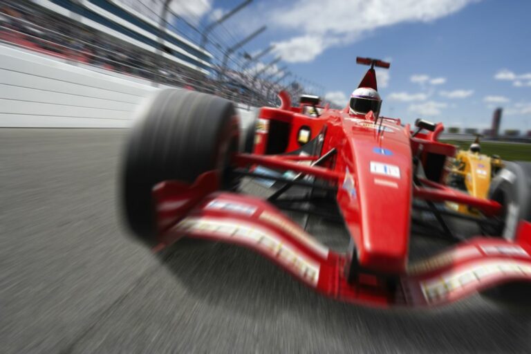 Man driving Formula 1 race car (Digital Composite)